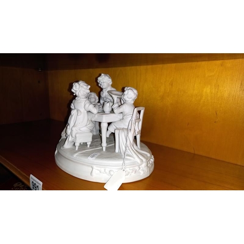 991 - A mid 20th century Parian figure depicting a children's tea party.