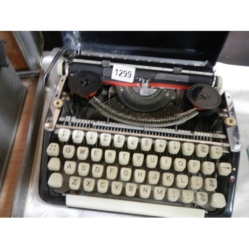 1299 - Two vintage typewriters.