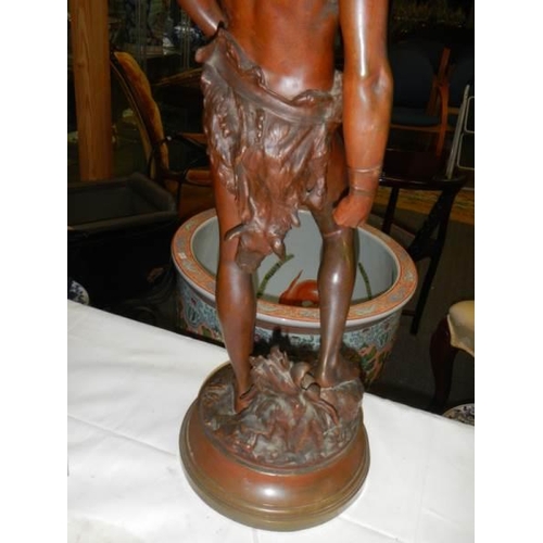 1339 - A large heavy bronze swivel figure, 67 cm tall.