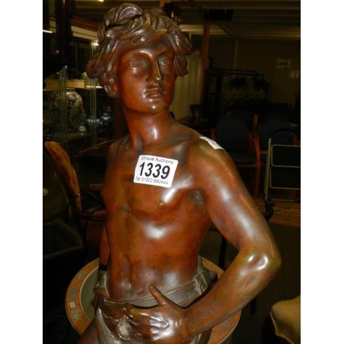 1339 - A large heavy bronze swivel figure, 67 cm tall.