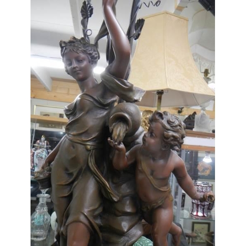 1340 - A 20th century bronze effect triple light figural table lamp. COLLECT ONLY.