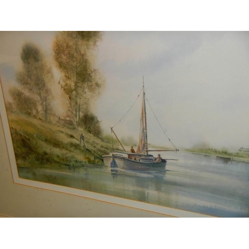 1358 - A framed and glazed watercolour river with boat signed Edward Emerson.