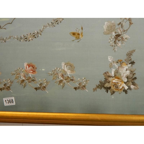 1368 - A large embroidery on silk of flowers and birds. COLLECT ONLY