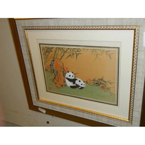 1379 - A pair of framed and glazed watercolours featuring panda's.