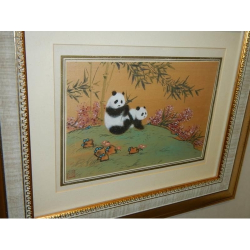 1379 - A pair of framed and glazed watercolours featuring panda's.