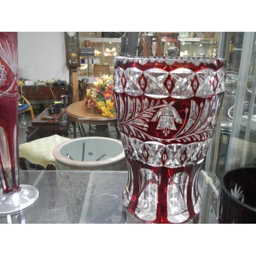 1422 - A quantity of red overlaid glass.