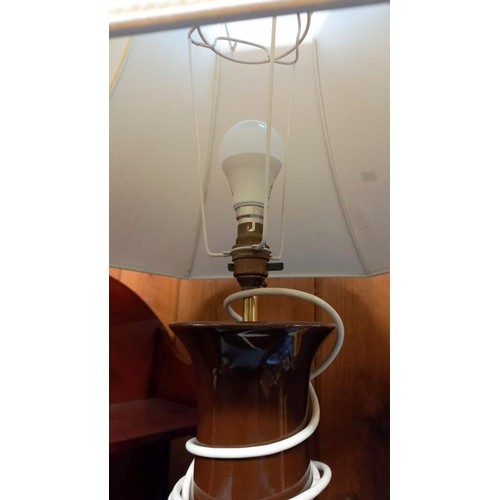 887 - A brown pottery table lamp, height 85cm, COLLECT ONLY