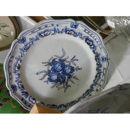 1237 - Three Delft style blue and white plates.