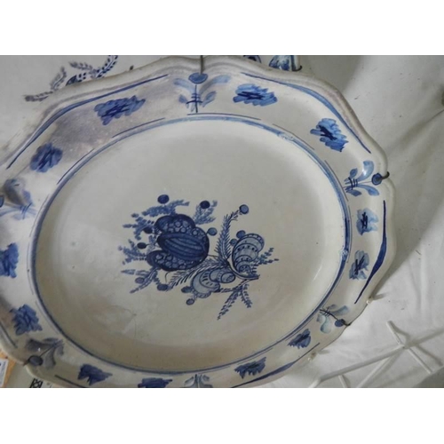 1237 - Three Delft style blue and white plates.