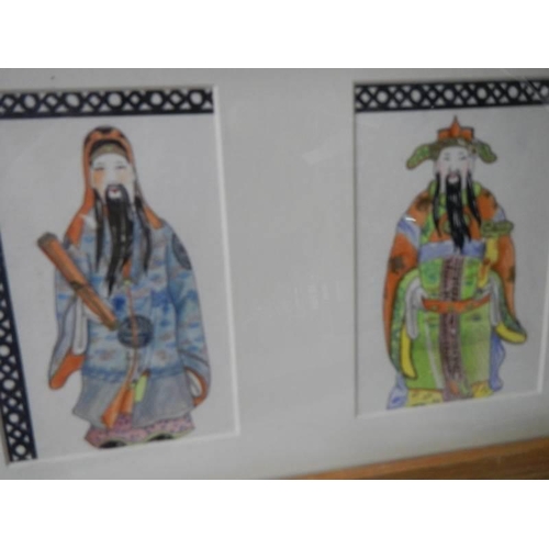 1239 - A framed and glazed set of three Chinese watercolours of Chinese gentlemen in one frame.