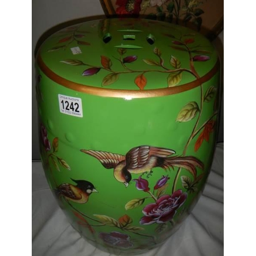 1242 - A Chinese hand painted ceramic garden stool featuring birds.