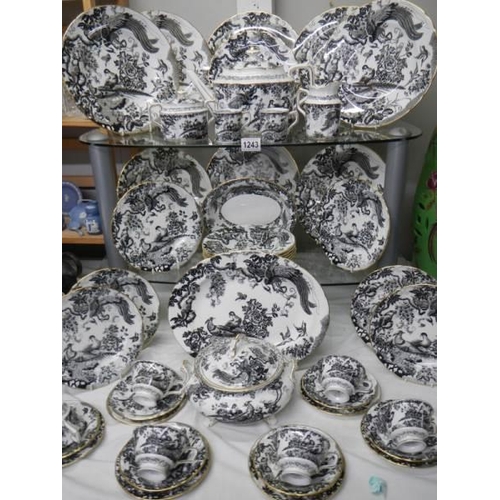 1243 - A Royal Crown Derby 'Black Aves' pattern dinner set, A1310, approximately 46 pieces.