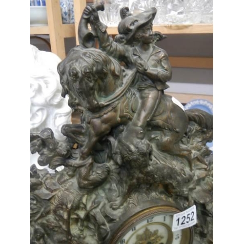 1252 - A heavy cast iron mantel clock.