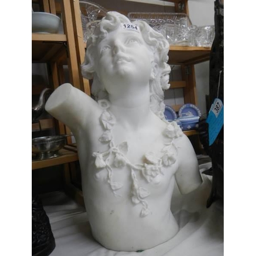 1254 - A heavy Italian marble bust of a young girl, 47 cm tall.