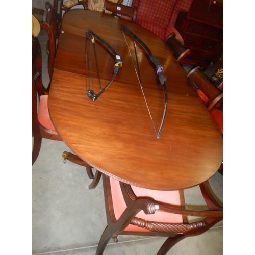 1524 - An oval mahogany dining chair with a set of six rail back chairs, COLLECT ONLY.