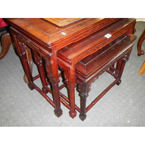 1551 - A good nest of three mahogany Chinese style tables, COLLECT ONLY.