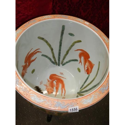 1556 - A large Chinese fish bowl on stand. COLLECT ONLY.