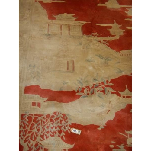 1561 - A large Chinese patterned carpet, 300 x 185 cm, COLLECT ONLY.