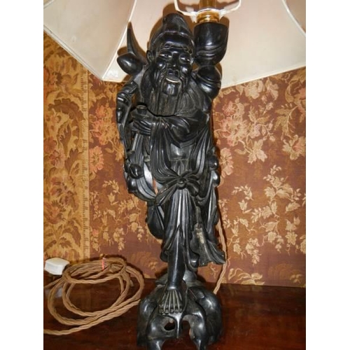 1569 - A Chinese figural table lamp. COLLECT ONLY.