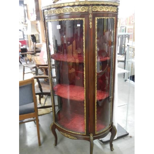 1574 - A 19th century French demi lune vitrine, 150 cm tall.COLLECT ONLY.