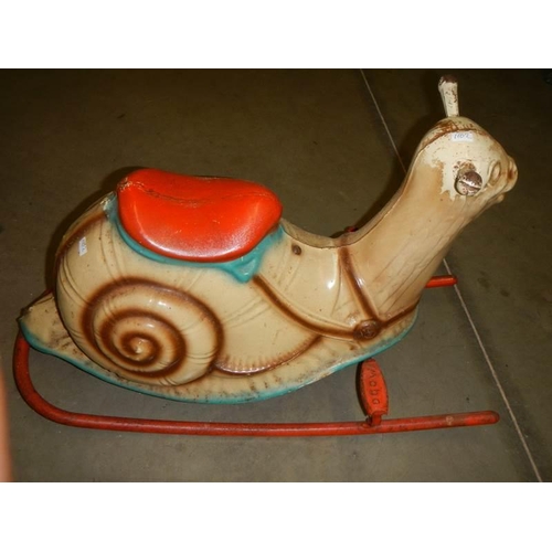 1575 - A 1950's Mobo pressed steel rocking snail, COLLECT ONLY.