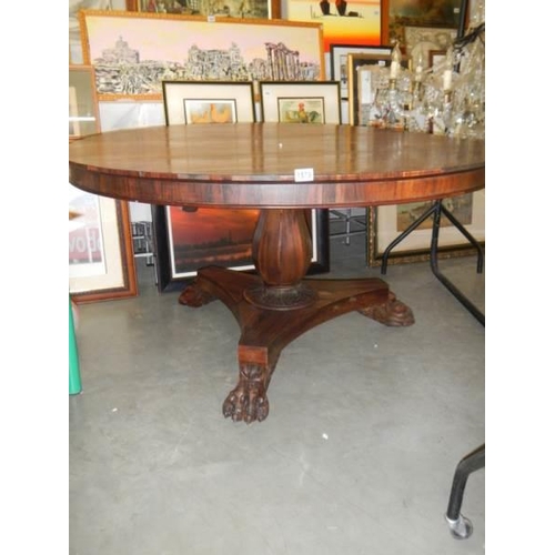 1579 - A Victorian rosewood tip top dining table.