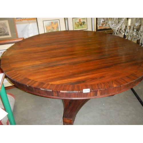 1579 - A Victorian rosewood tip top dining table.