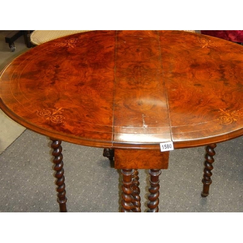 1580 - A Victorian walnut inlaid Sutherland table on barley twist supports, COLLECT ONLY.