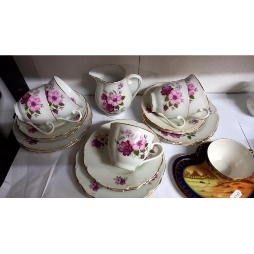 703 - Two 2 part tea sets & 1 other