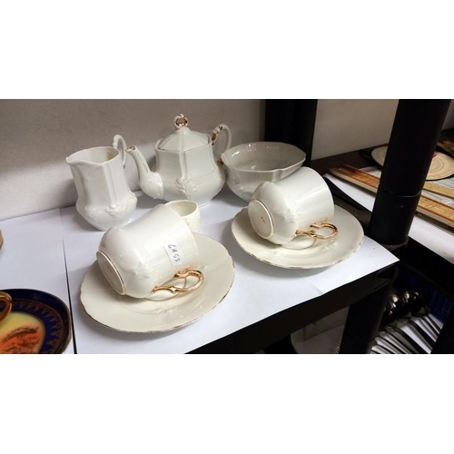 703 - Two 2 part tea sets & 1 other