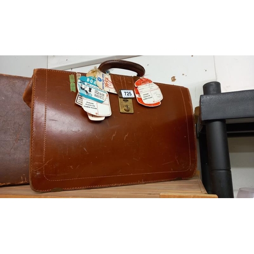 725 - A leather briefcase & a suitcase