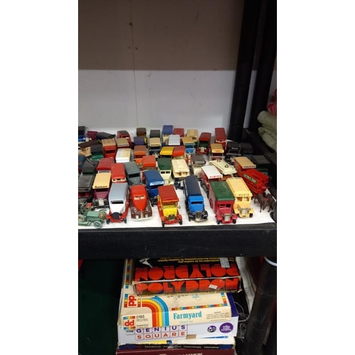 733 - A large collection of unboxed Lledo die cast vans & cars