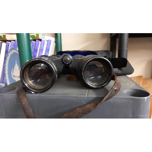 743 - A pair of old binoculars in modern case