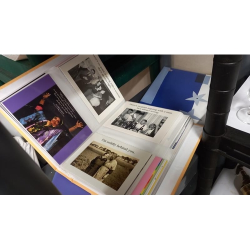 745 - 3 albums containing various postcards & pictures