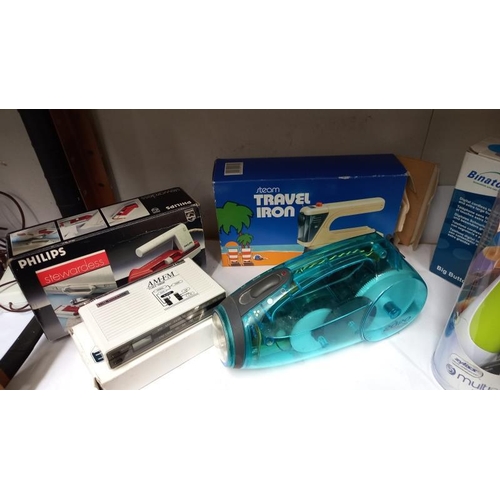 761 - A cordless torch, electric peeler & travel iron etc.