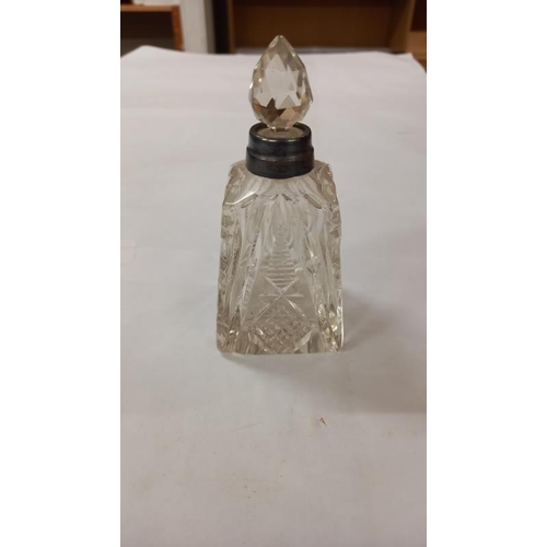 769 - A silver necked perfume bottle & 2 others