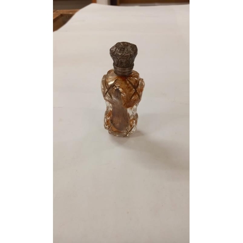 769 - A silver necked perfume bottle & 2 others