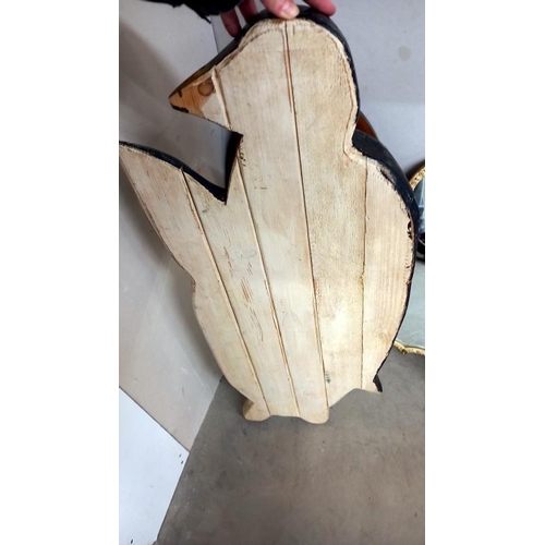 802 - A large carved wooden wall plaque of a penguin, height 90cm, COLLECT ONLY