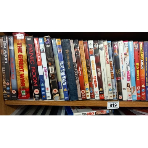 819 - 2 shelves of DVD's plus 2 Blu Ray