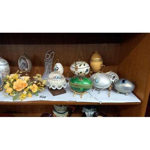 828 - A quantity of decorative eggs etc.