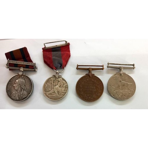 1048 - A collection of medals including Victoria Defence of Ladysmith medal for Pte G Bennett, Faithful Ser... 