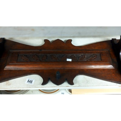 848 - An arts & crafts oak gun/coat rack