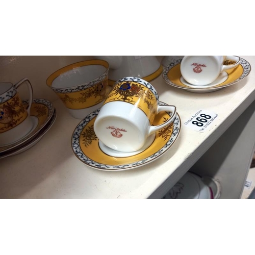 868 - A Noritake tea set (only 4 cups)