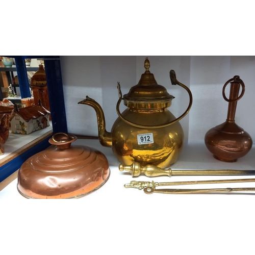 912 - A selection of brass & copper including chestnut roaster, foot warmer & brass kettle etc.