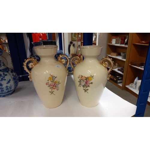 918 - A pair of Victorian pottery vases