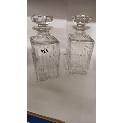 925 - A pair of square cut glass decanters