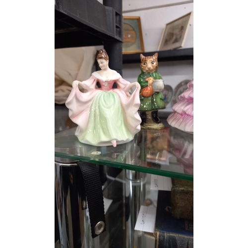 934 - A Coalport First dance figure, 3 Doulton figures & a Beswick Simpson cat