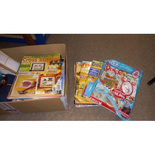 945 - 3 boxes of material, cross stitch magazines some with gifts attached plus other magazines, Chinese p... 