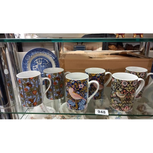 948 - A good lot of china on 3 shelves plus 8 new William Morris mugs (strawberry thief etc)