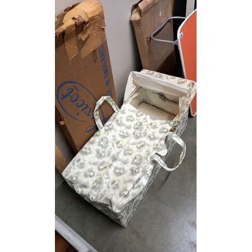 996 - A boxed vintage Luxicot baby carry cot & a bed trat